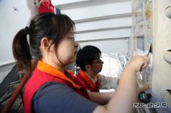 国网佳木斯供电公司：治理城市“牛皮癣” 美化环境“靓”社区